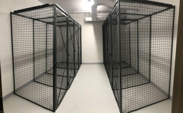 Rows of grey wire mesh condo storage lockers