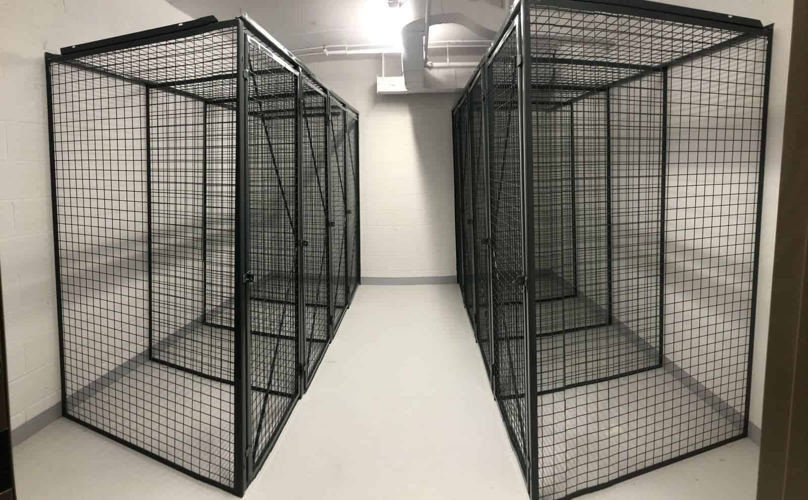 Rows of grey wire mesh condo storage lockers