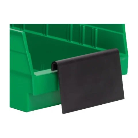 Black angled extended label holder on a green shelf bin