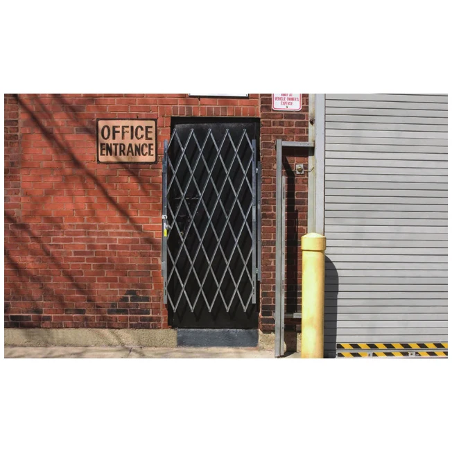 Heavy-duty folding door gate on an office entrance