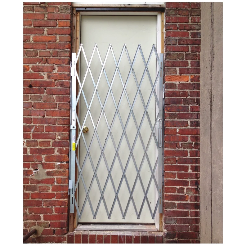 Heavy-duty folding door gate installed in a doorway