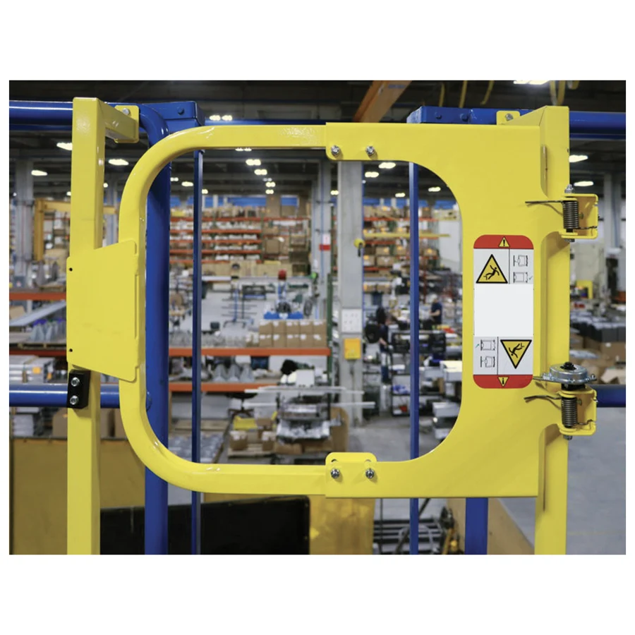 Yellow self-closing ladder safety gate mounted at a platform opening