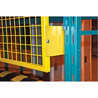 Close-up of a yellow wire mesh guard bracket mounted to a pallet rack upright