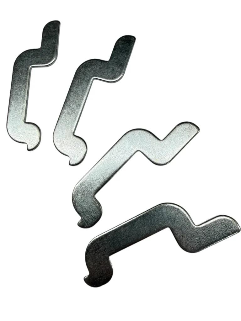 Four System 200 compression shelf clips