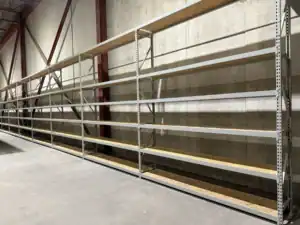 Long run of wide span shelving with wood decks