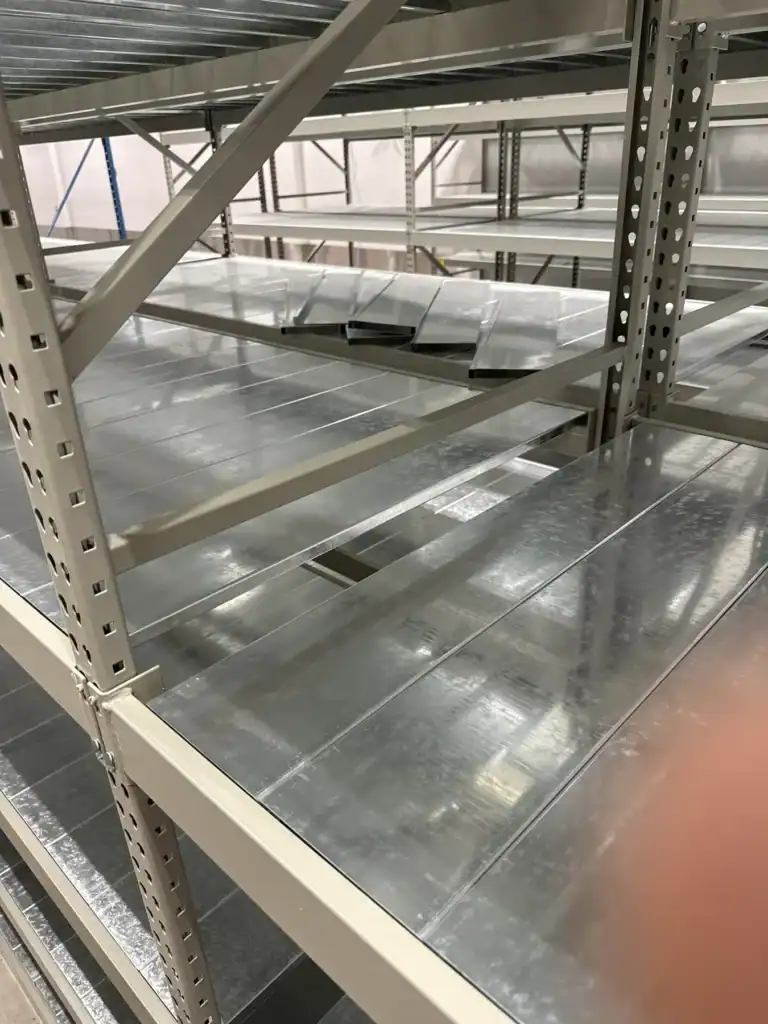 Galvanized steel shelf pans installed in System 800 shelving