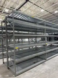 System 800 shelving bay with multiple steel shelf levels