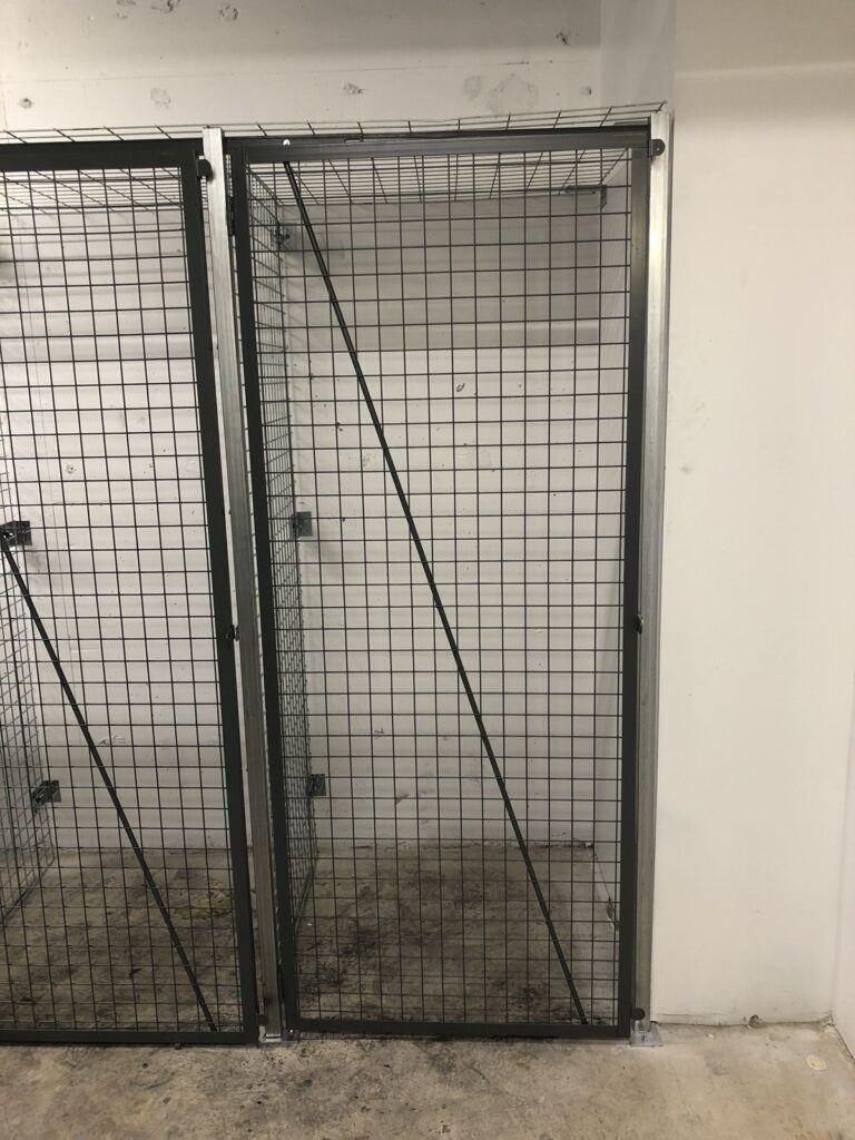 Close-up of wire mesh locker doors