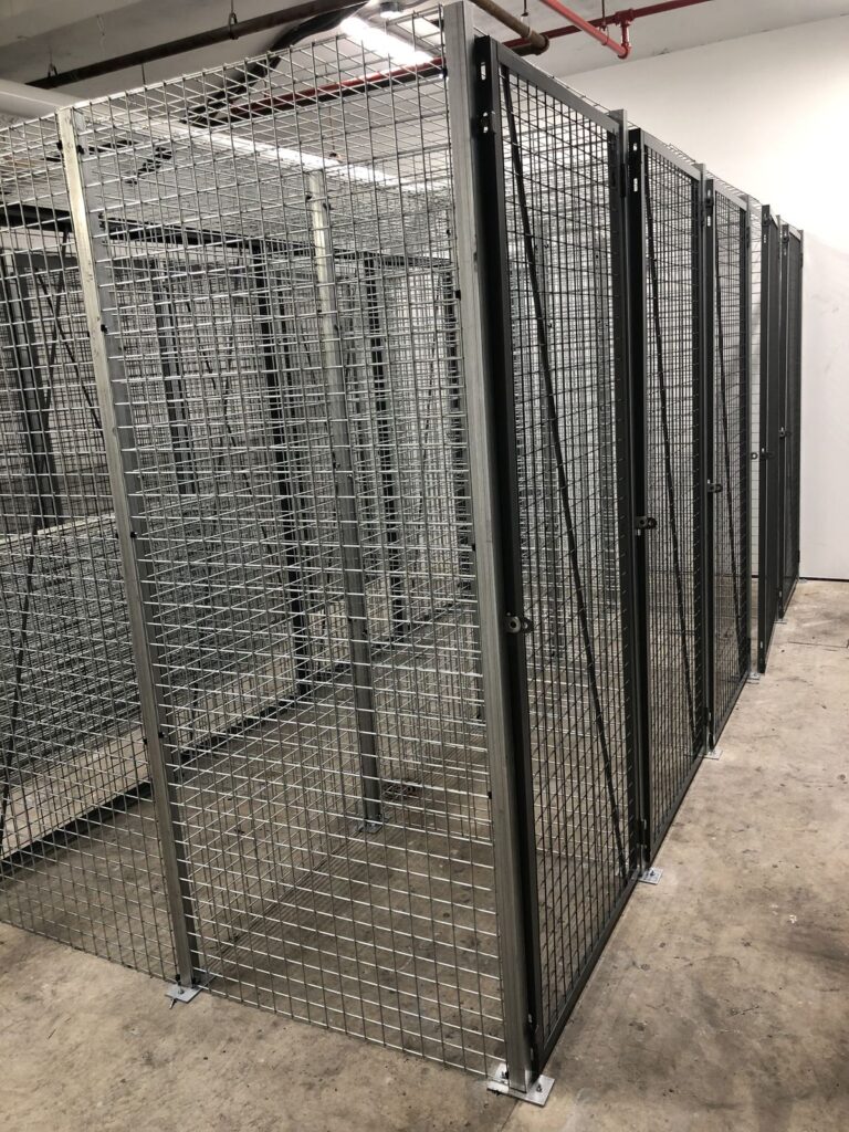 End view of a row of wire mesh storage lockers