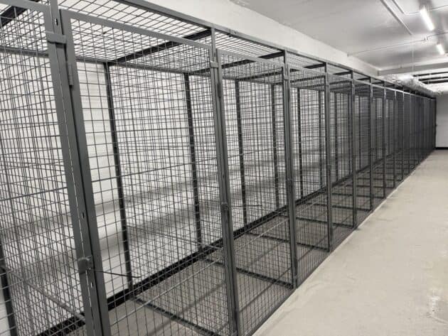 Long row of wire mesh tenant storage lockers